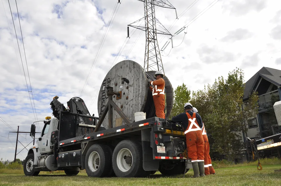 An image of the cable pulling team at work.